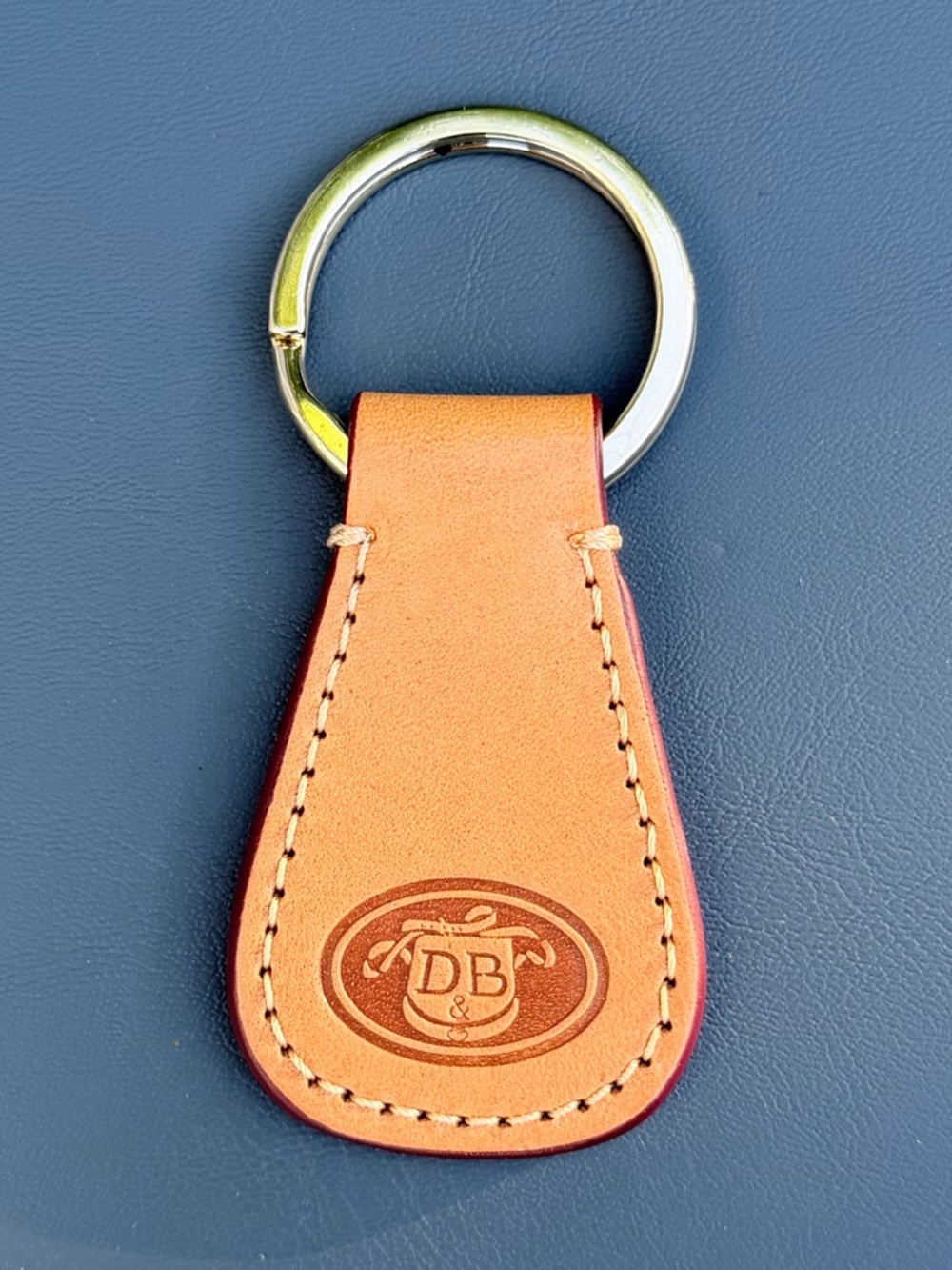 Dooney & Bourke Embossed Logo Tan Leather Strap Key Fob